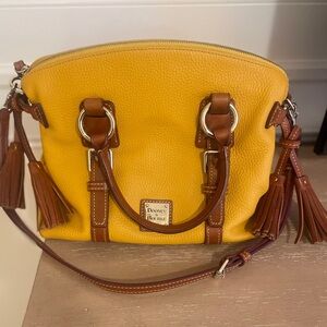 New. Never used. Dooney and Bourke satchel.